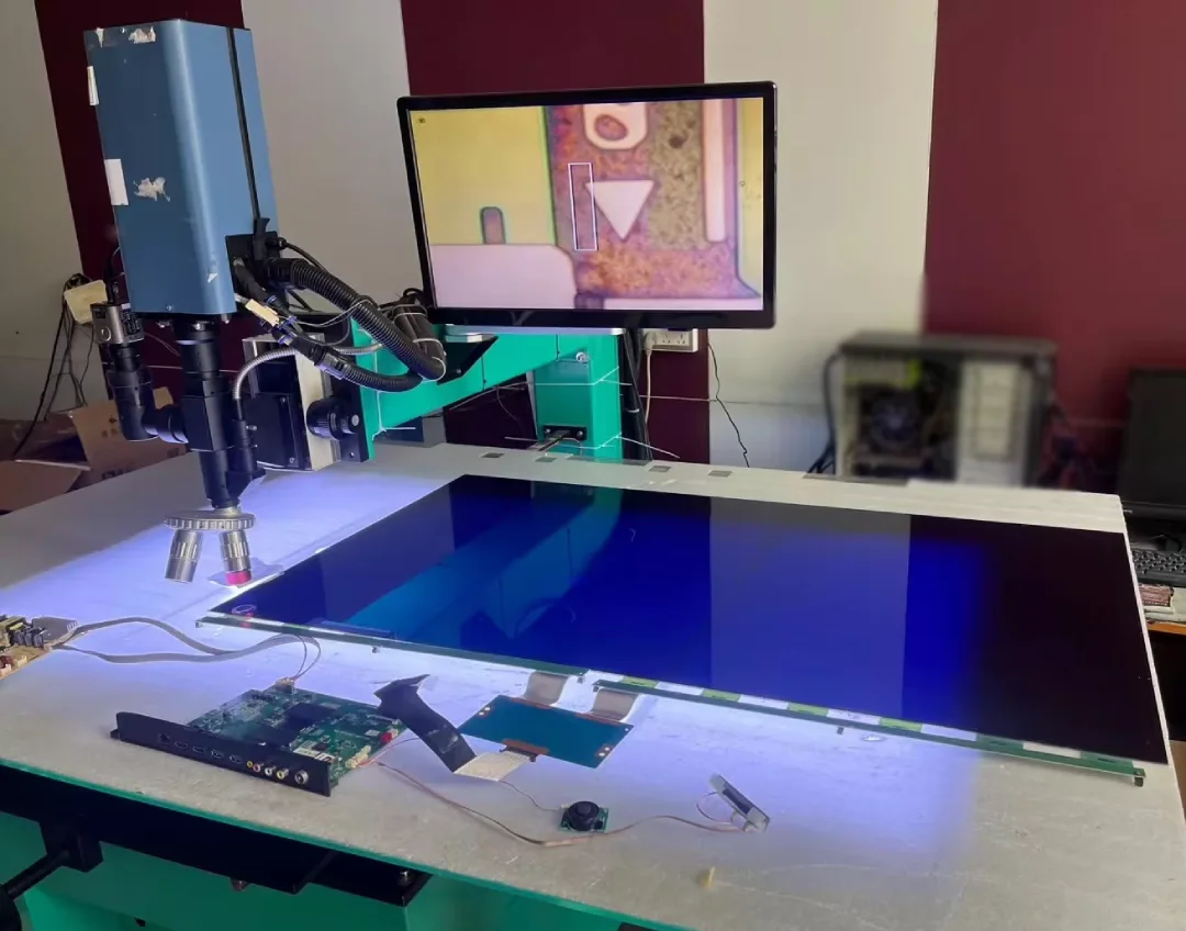 A laser machine designed to fix LCD open cell screen, by modifying its internal circuit.